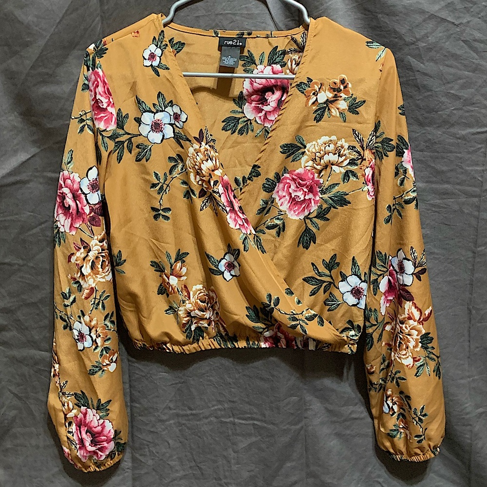 Rue21 Long sleeved blouse w/ Cross open cut in front
